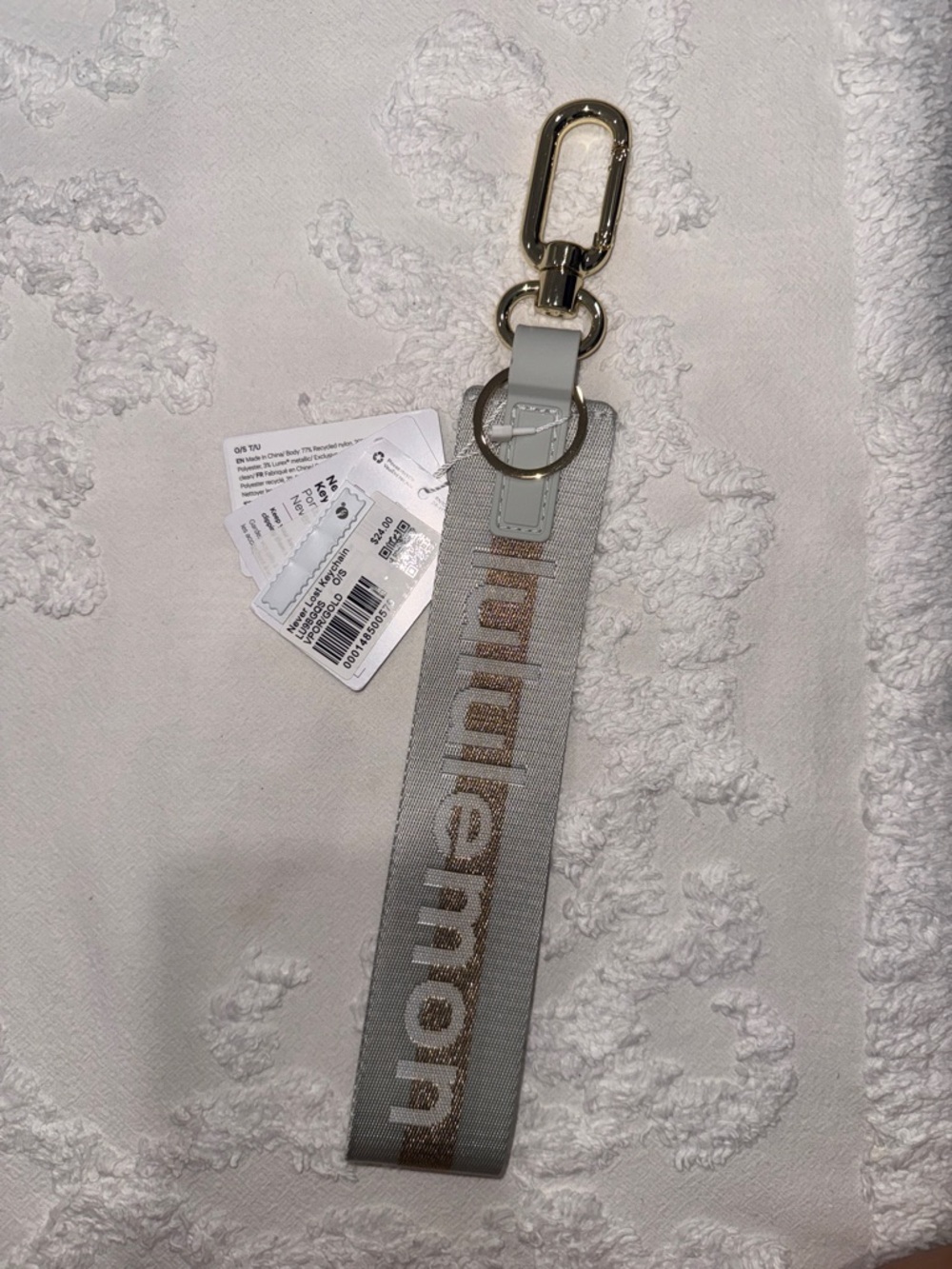 Lululemon grays/mint Never Lost Keychain with Gold Logo Accent